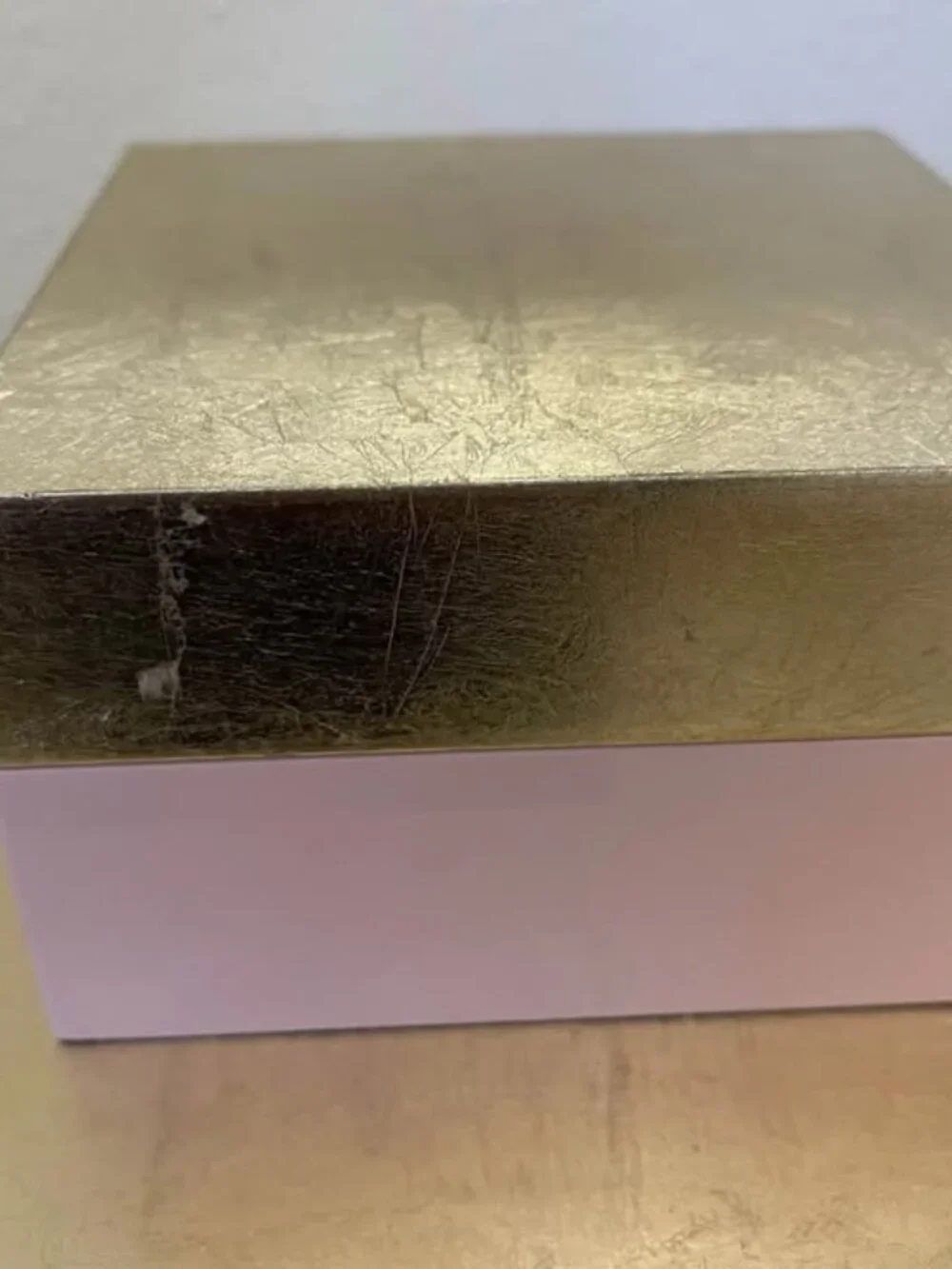 Set of two pink and gold laquered decorative square storage boxes